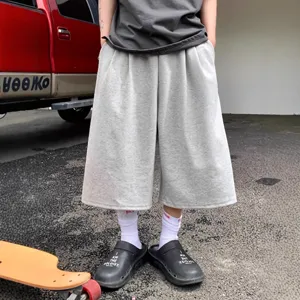 Men solid color casual wide leg shorts summer streetwear loose fashion cropped sweatpants.