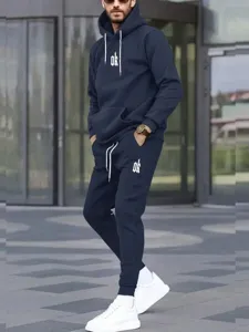Men casual hooded sweatshirt and sweatpants tracksuit set with letter print details.