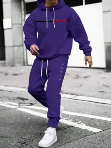 Detail view of men purple hooded sweatshirt and sweatpants set with letter print and drawstrings.