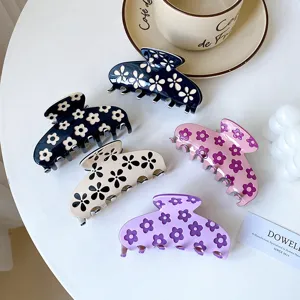 Floral acrylic hair claw clip set for women in five elegant pastel colors and patterns.