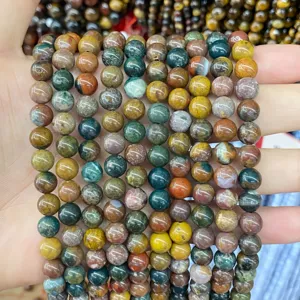Detailed macro view of multi-color natural agate stone beads for DIY jewelry making