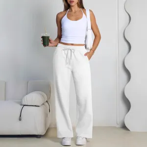 Womens casual white wide leg sweatpants and sexy halter top outfit for daily wear
