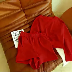 Red long sleeve sweatshirt and shorts set, casual cozy two piece casual outfit for women.