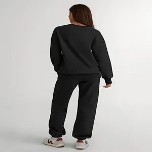 Detailed view of the back design for the casual black two piece outfit, plain style.