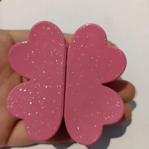 Pink glitter four-leaf clover magnetic hair clip, stylish hair accessory for daily use.