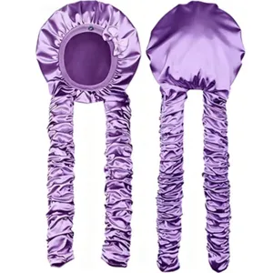 Detail view of long purple satin sleep cap with extra long pleated tails for hair protection.