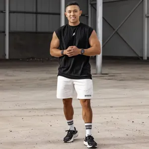 Men's sleeveless fitness training tank top and breathable sports shorts activewear set.