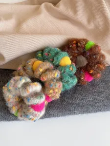 Colorful plush hair scrunchies with fuzzy pom poms, soft and durable telephone wire hair ties.