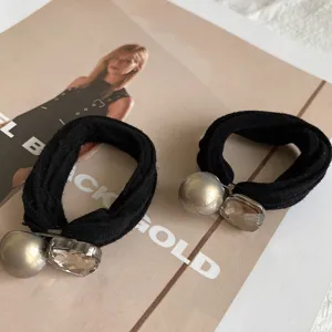 Elegante elastico per capelli nero con ciondolo in perla e cristallo per donne