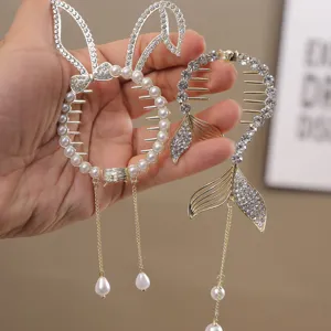Rhinestone pearl hair bun maker and ponytail clip set for girls, elegant hair styling accessory.