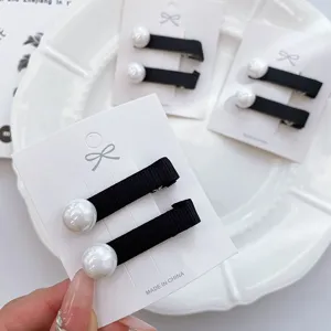 Elegant black ribbon pearl hair clips set, cute side bangs clips for women and girls daily wear.