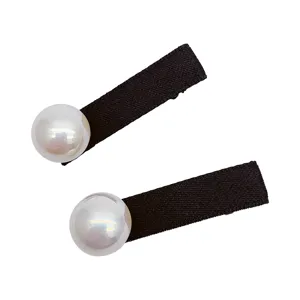 Elegant black fabric hair clips featuring a large glossy pearl accent for women and girls.