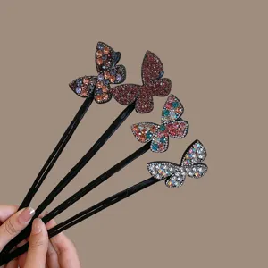 Rhinestone butterfly hair bun maker, elegant black french twist tool for women styling hair.