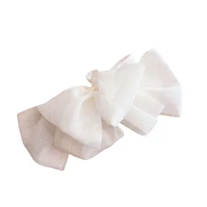 Large double-sided bow mesh hair claw clip for elegant women styling and everyday hair updo.