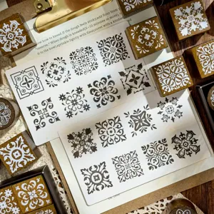 Vintage wooden stamp set with retro floral patterns for DIY journal decoration crafts.