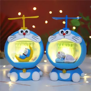 Linda luz nocturna de Doraemon dibujos animados resina dormitorio lámpara de mesa regalo.