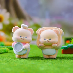 Cute flocked bear blind box figurine, chef and toast bear design for desktop decor and gifts.