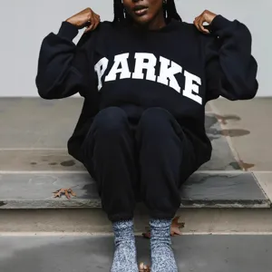 Women black crewneck sweatshirt with letter print for casual daily wear and fashion style.