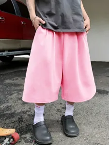 Men's casual pink wide-leg shorts, comfortable streetwear loose fit capri trousers for summer.