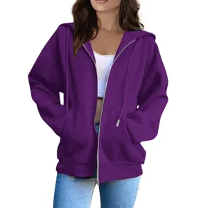 Detail view of the casual purple zip-up hoodie featuring comfortable pockets and adjustable drawstrings.