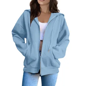 Light blue zip-up hoodie for women, casual loose long sleeve hooded sweatshirt with pockets.