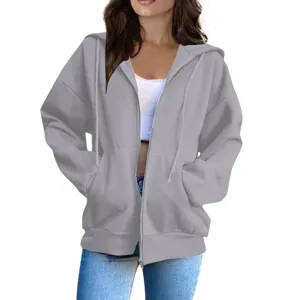 Detailed view of the casual grey zip-up hoodie featuring convenient pockets and cozy hood.