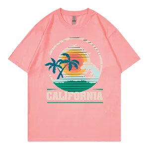 Pink short sleeve crewneck t-shirt featuring a retro California sunset and palm tree graphic.