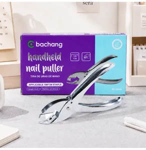 Detail shot of handheld metal staple remover with triangle mouth for effortless office paper binding.