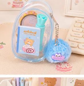 Transparent pencil case stationery set with cute bear notebook and fluffy plush charm for students.