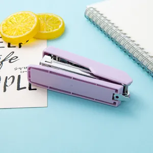 Macaron portable mini stapler, compact handheld desktop binding tool for office and school.