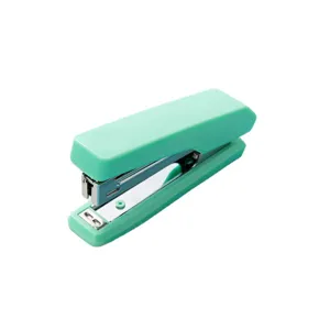 Macaron green portable handheld stapler for office and school use, compact mini design.