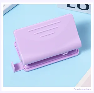Macaron purple two-hole puncher for student stationery loose-leaf binding and daily planning.
