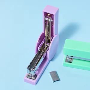 Portable office stapler for desktop use, durable binding tool with metal mechanism.