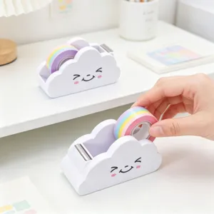Cute cloud tape dispenser with pastel washi tape for desktop organization and bullet journal.