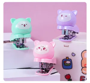 Cute macaron cat mini stapler detail view, pastel color cartoon stationery set for students.