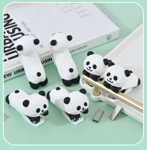 Detailed shot of cute cartoon panda stapler with soft rubber doll design, perfect for students.