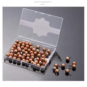 Roségoldene Kugelkopf-Pinnadeln in transparenter Kunststoff-Box, dekorative Metall-Reißzwecken.