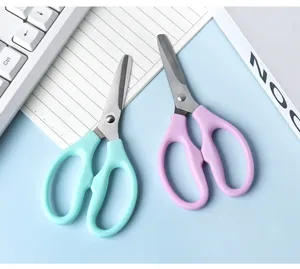 Stainless steel safety scissors with round head in mint green and light purple colors.