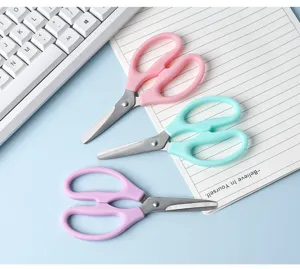Cute pastel stationery scissors with stainless steel blades for office and school crafts.