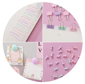 Macaron kleur stationery detail met paperclips, klemmen, duimspijkers en memo's.