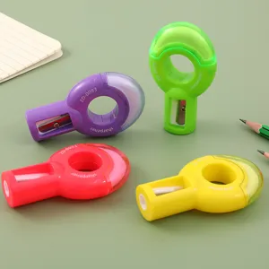 Bunter kreativer Ring-Anspitzer für Schüler, niedlicher farbiger Schreibwaren-Bleistiftspitzer.