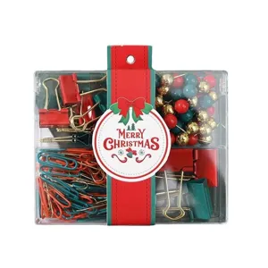 Weihnachts Schreibwaren Set mit roten, grünen und goldenen Büroklammern und Pins.
