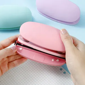 Macaron color 6mm double hole punch with soft silicone, perfect for office document organization.