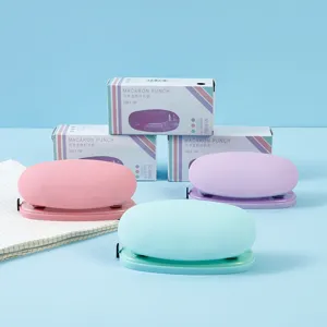 Macaron color double hole puncher for office and school, smooth silicone finish with ruler.