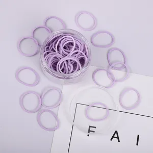 Lila Makronen Gummibänder Set im klaren Eimerbehälter für Büro und Schulbedarf ideal geeignet.