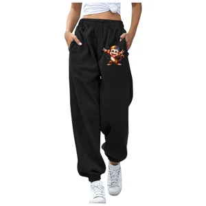 Comodi pantaloni della tuta neri con stampa di scimmia e vita elastica regolabile.