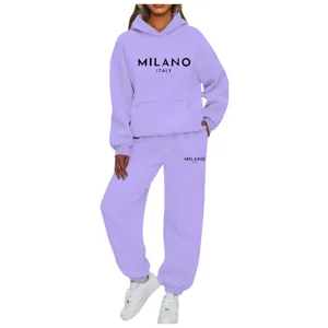 Women casual light purple hooded sweatshirt and matching sweatpants tracksuit set.