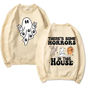 Beige long sleeve crewneck sweatshirt featuring spooky ghost and Halloween horror print graphics.