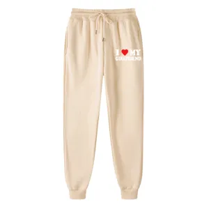 Casual thick fleece sweatpants with drawstring waist cuffed ankles and heart letter print.