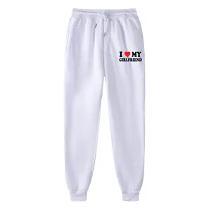 White casual fleece sweatpants with I love my girlfriend print, comfortable drawstring waist.